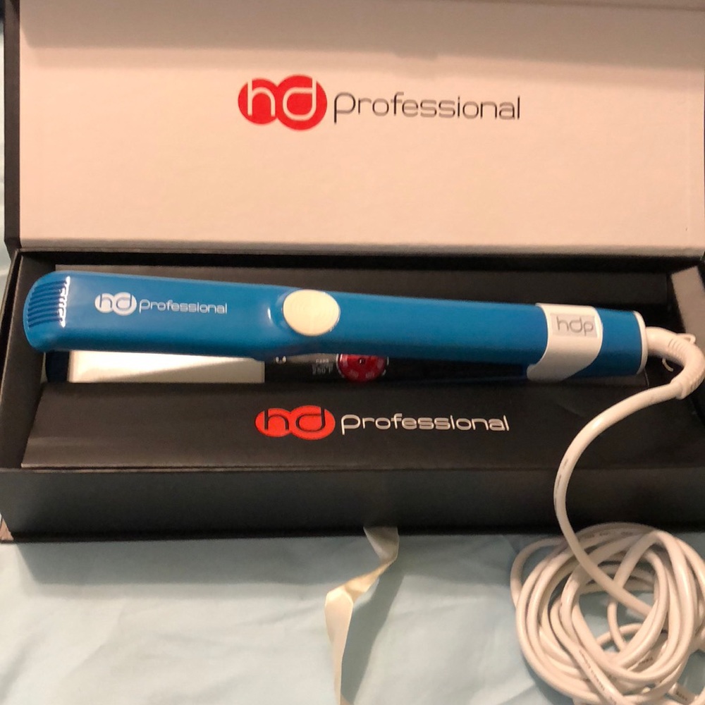 HD Flat iron 1.25” ceramic. Brand new, never used